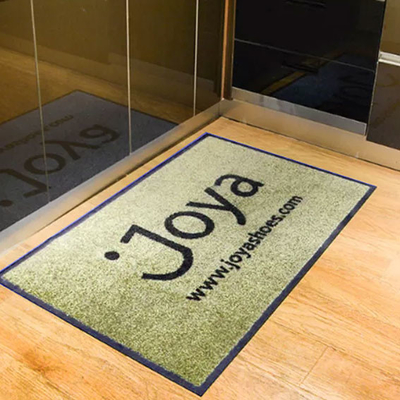 注文の印刷物の商業入口のマットはロゴの玄関マットの敷物のナイロン表面にカーペットを敷く